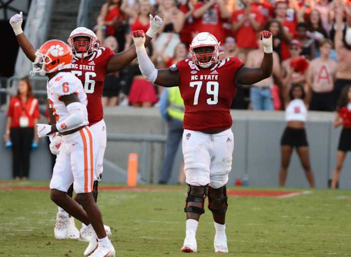 NC State tackle Ikem Ekwonu celebrates touchdown